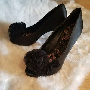 3in heel, open toeaccented black satin shoes